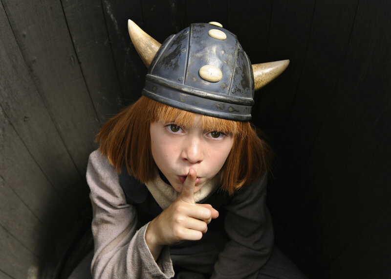 child in viking helmet