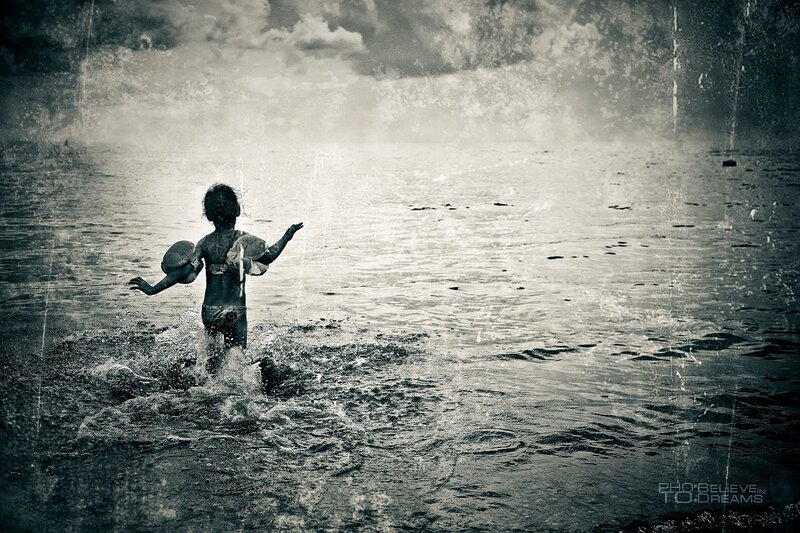 Child in Water — Black, Dramatic, Photograph