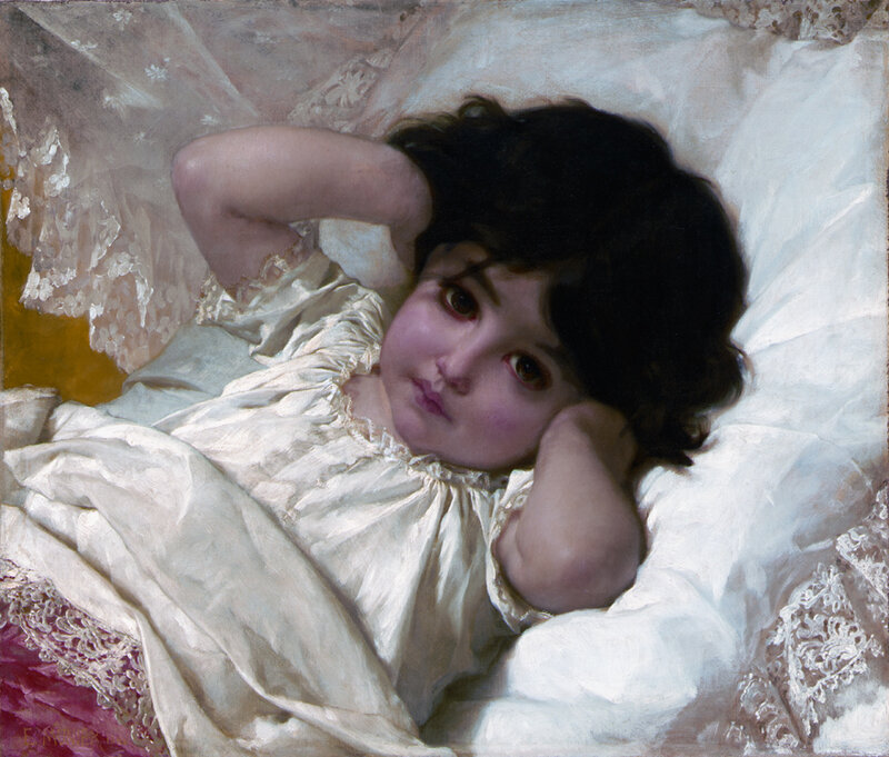 child in white dress lying down