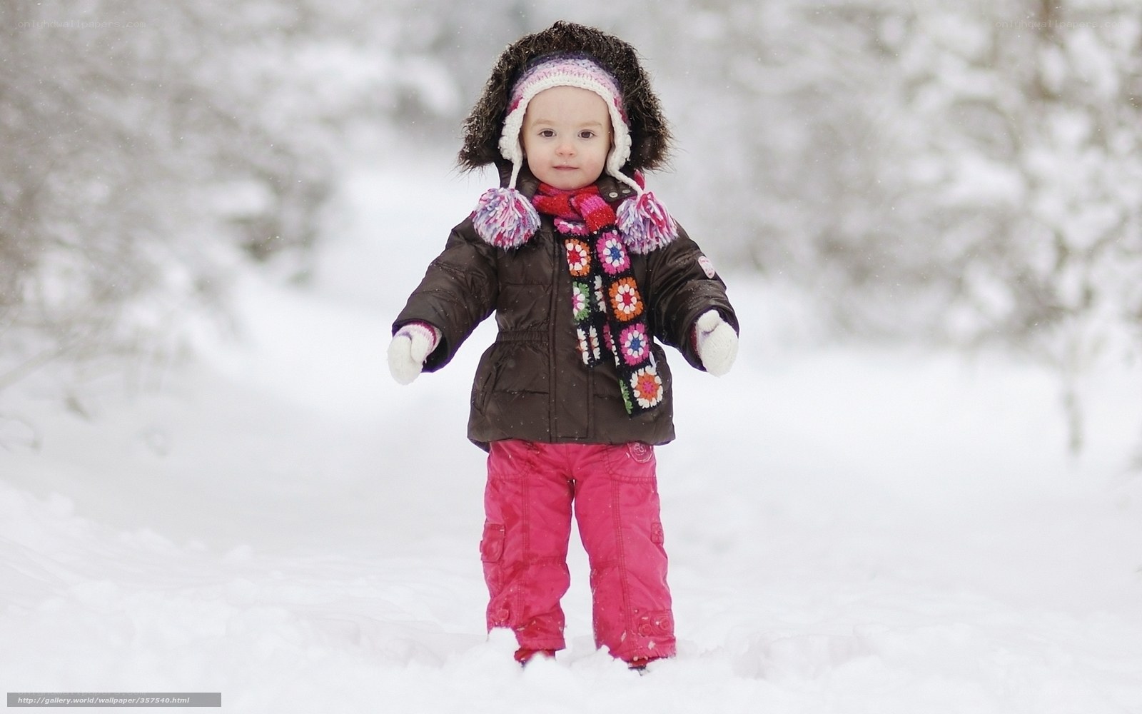 child in winter snow