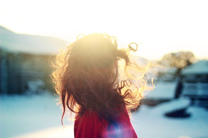 child in winter sunlight