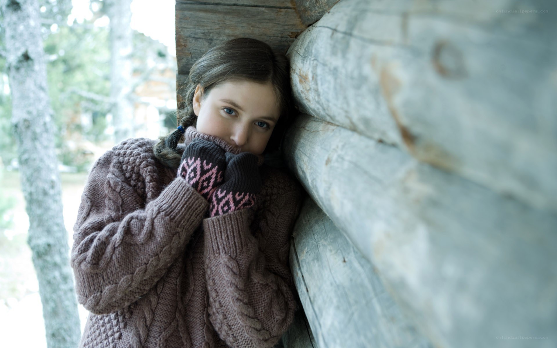 child in winter sweater