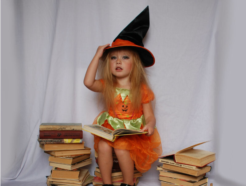 Child in Witch Costume — Orange, Playful