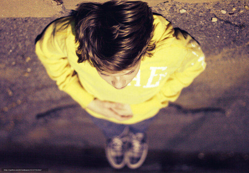 child in yellow hoodie