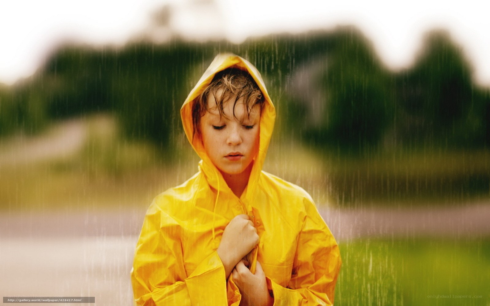child in yellow raincoat