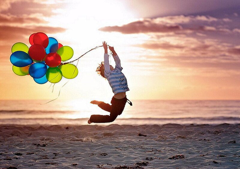 Child Jumping with Balloons — Blue