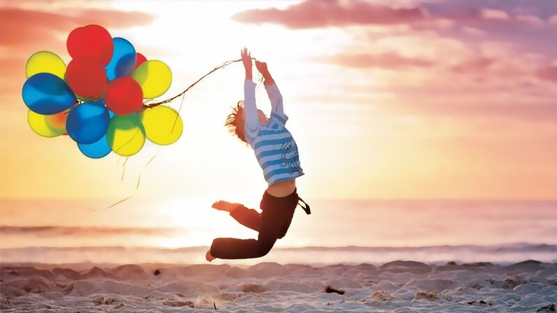 Child Jumping with Balloons — Orange