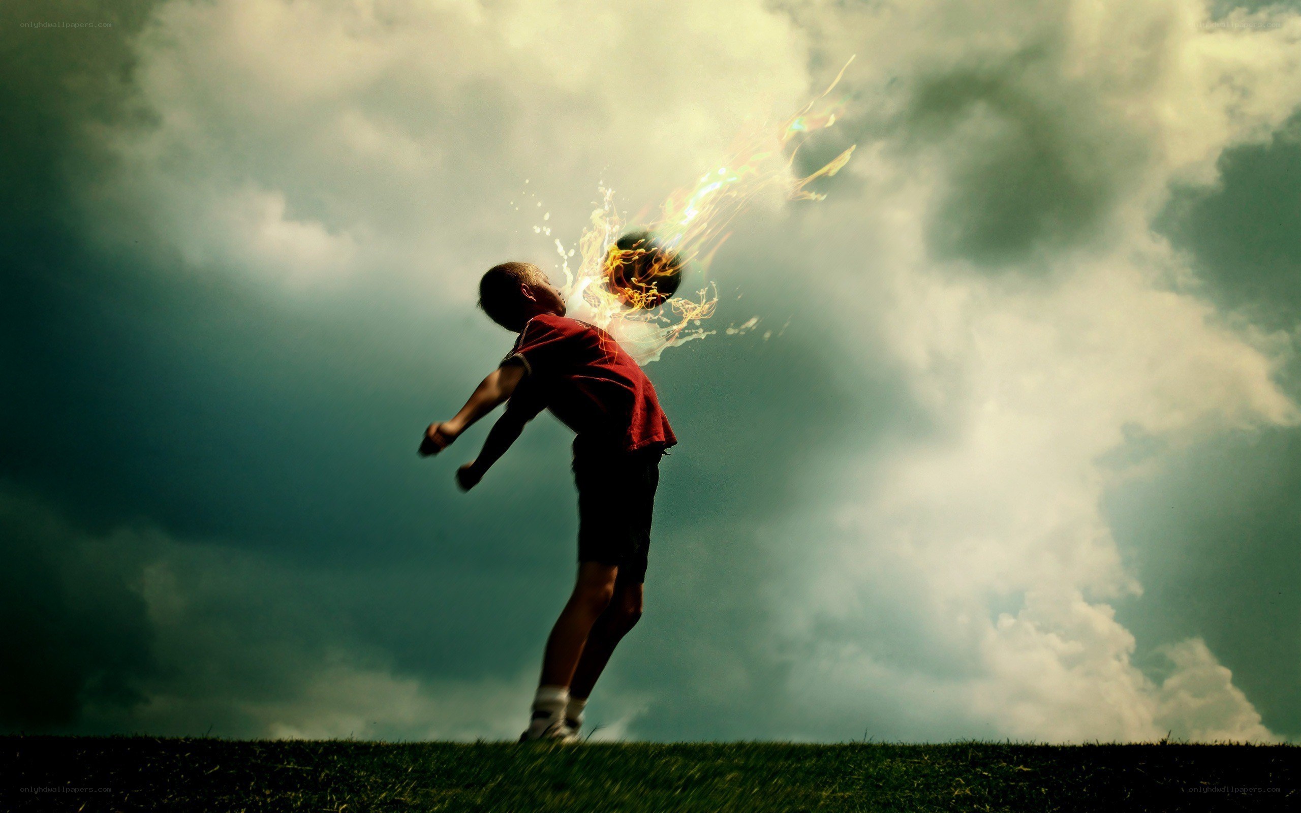 Child kicking flaming ball