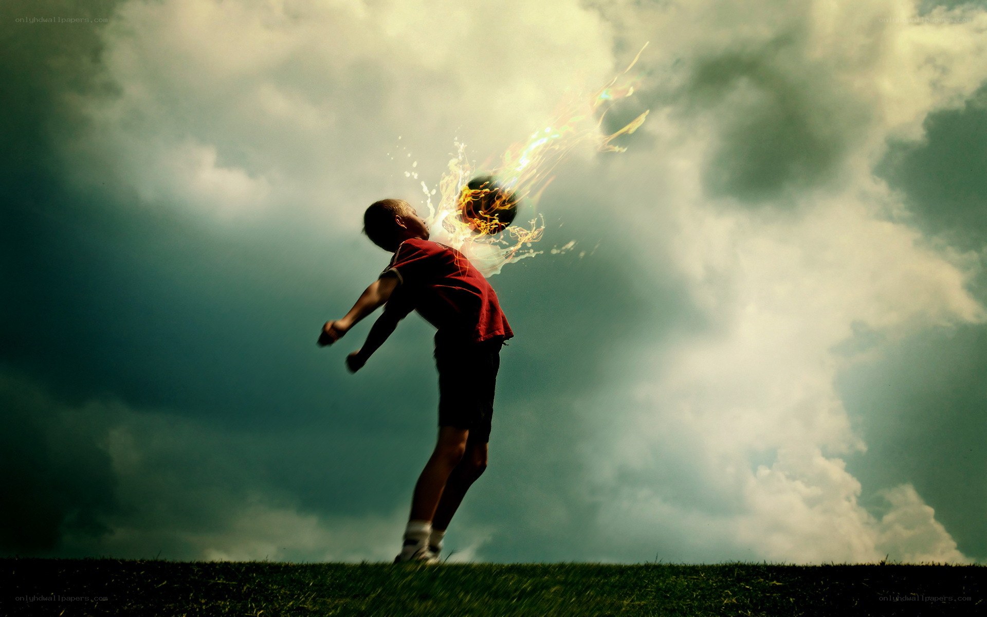 Child kicking flaming ball