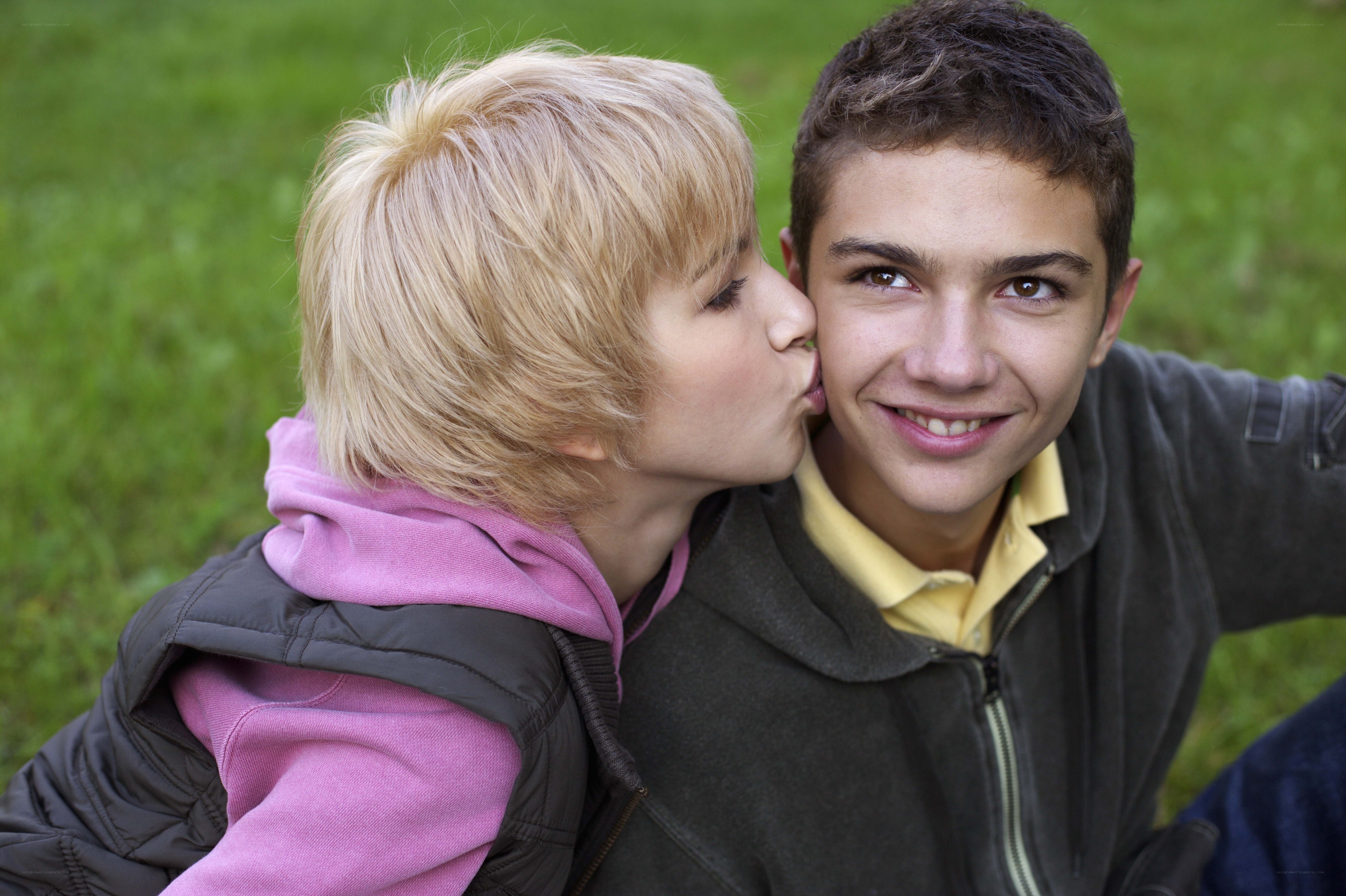 child kissing boy on cheek