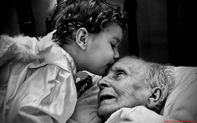 Child Kissing Elderly Woman — Black, Intimate