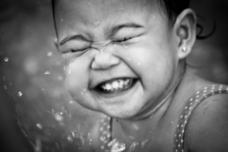 Child Laughing in Water