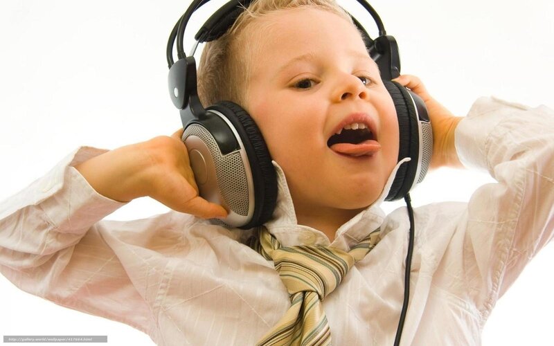 child listening to music