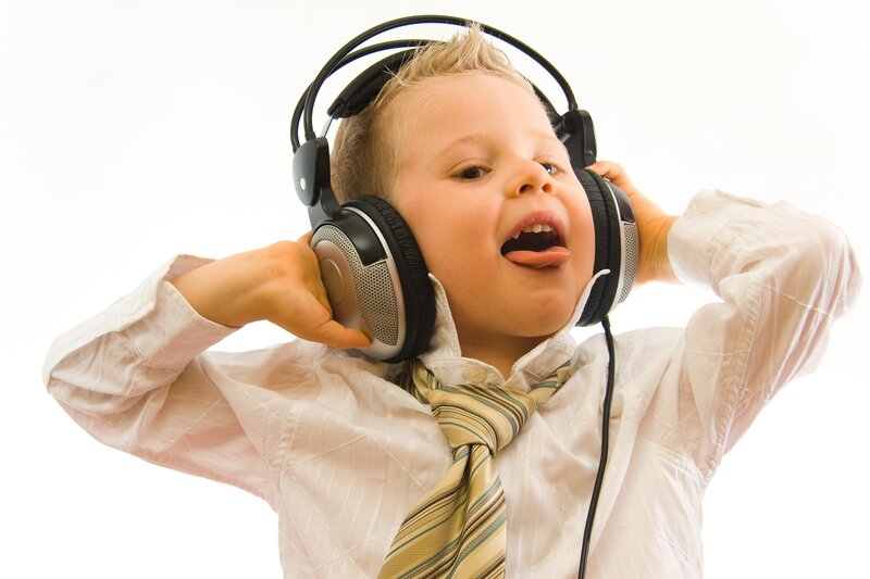 child listening to music