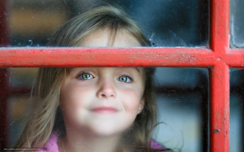 child looking through window