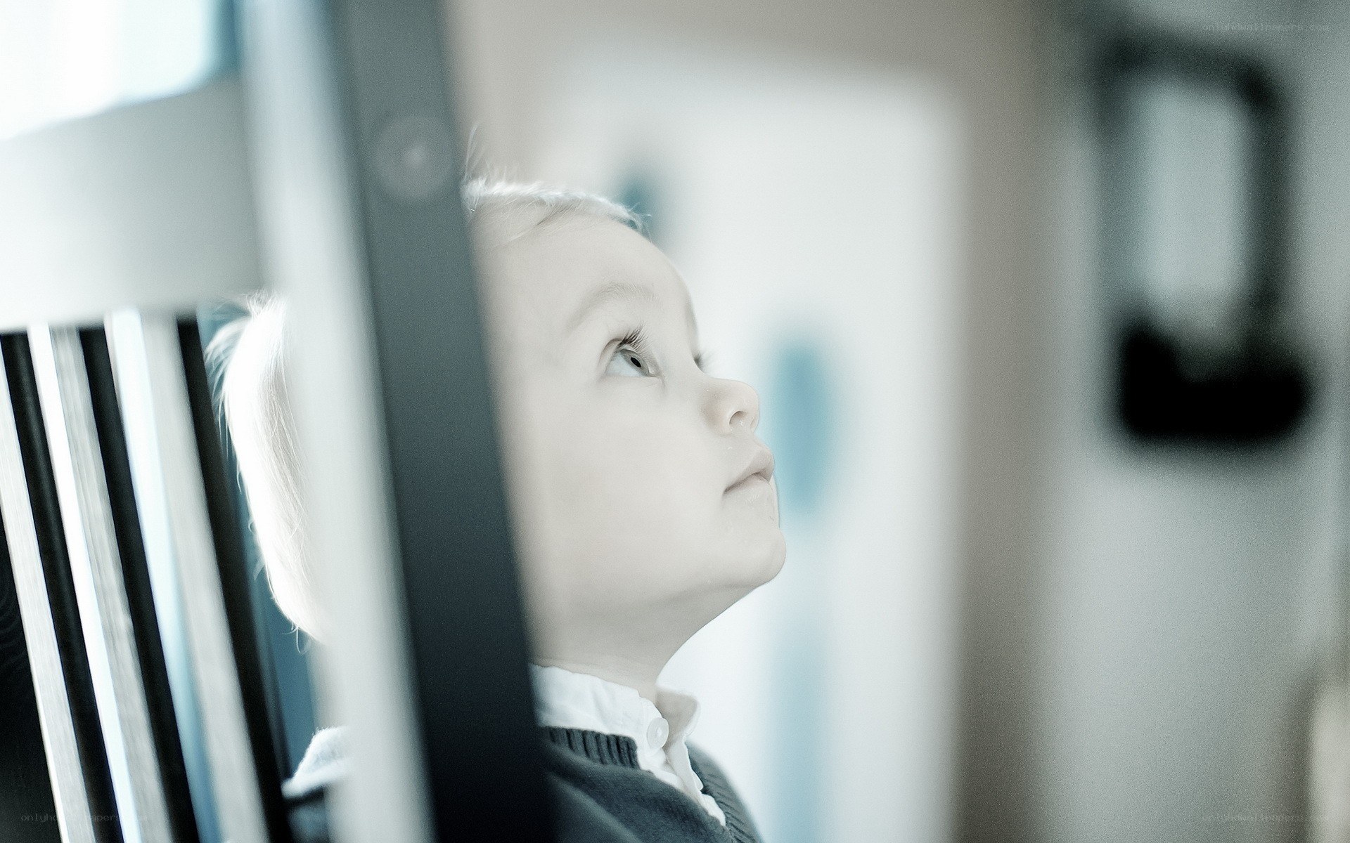 child looking up thoughtfully
