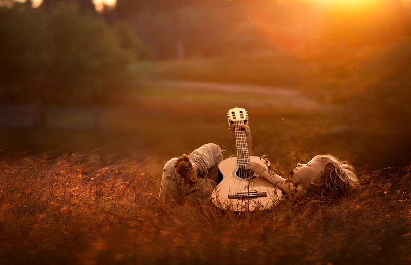 Child Lying in Field