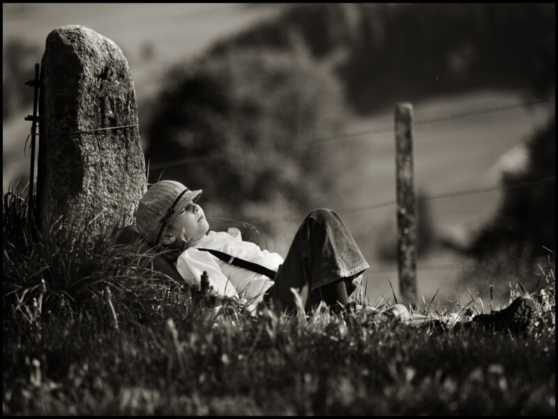 Child Lying in Grass — Black