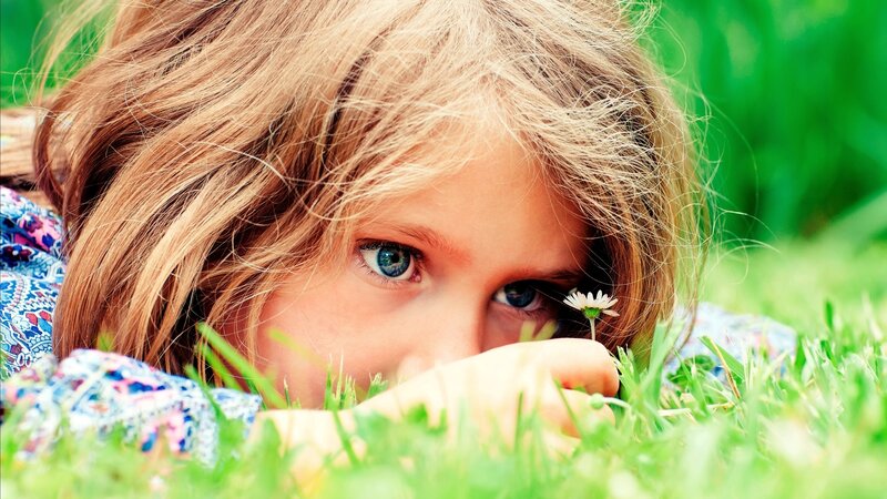 Child Lying in Grass — Green, Calm