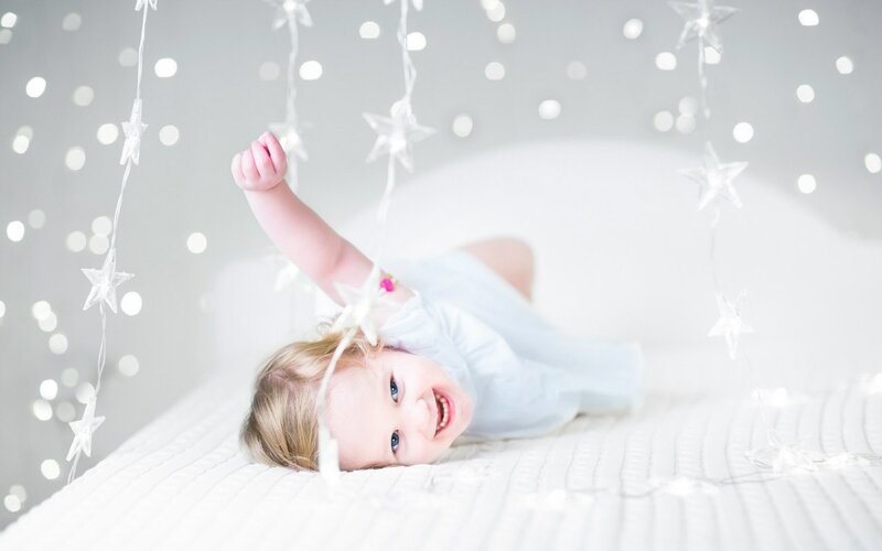 Child Lying on Bed