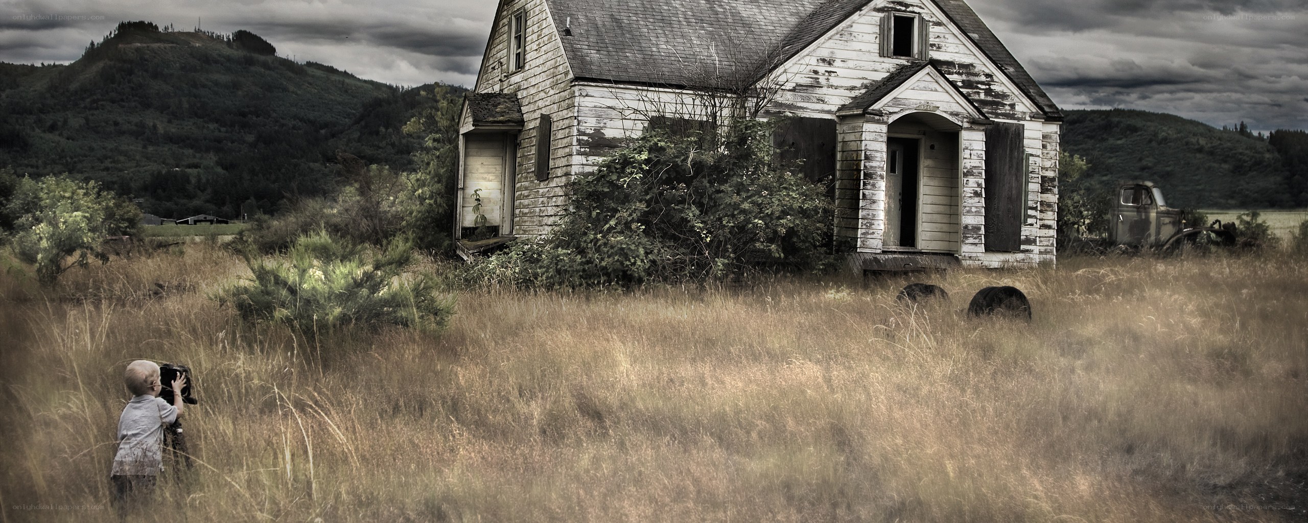 Child near abandoned house
