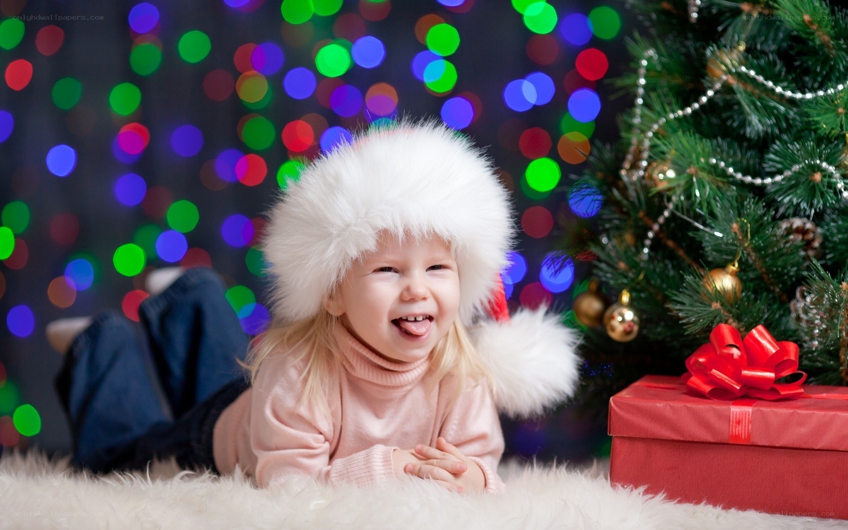 child near christmas tree