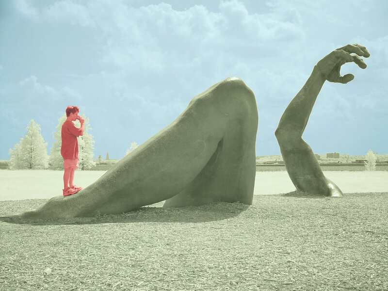 Child near giant sculpture