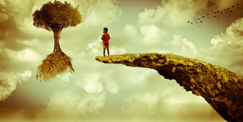 Child on a floating rock bridge