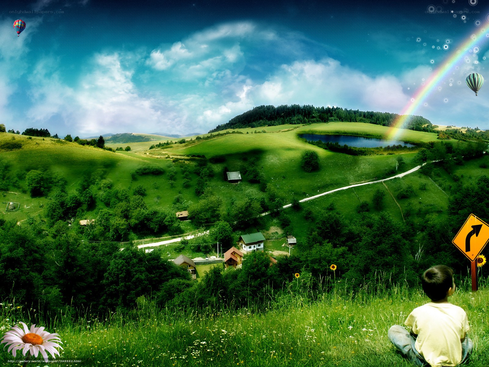 Child on a green hillside