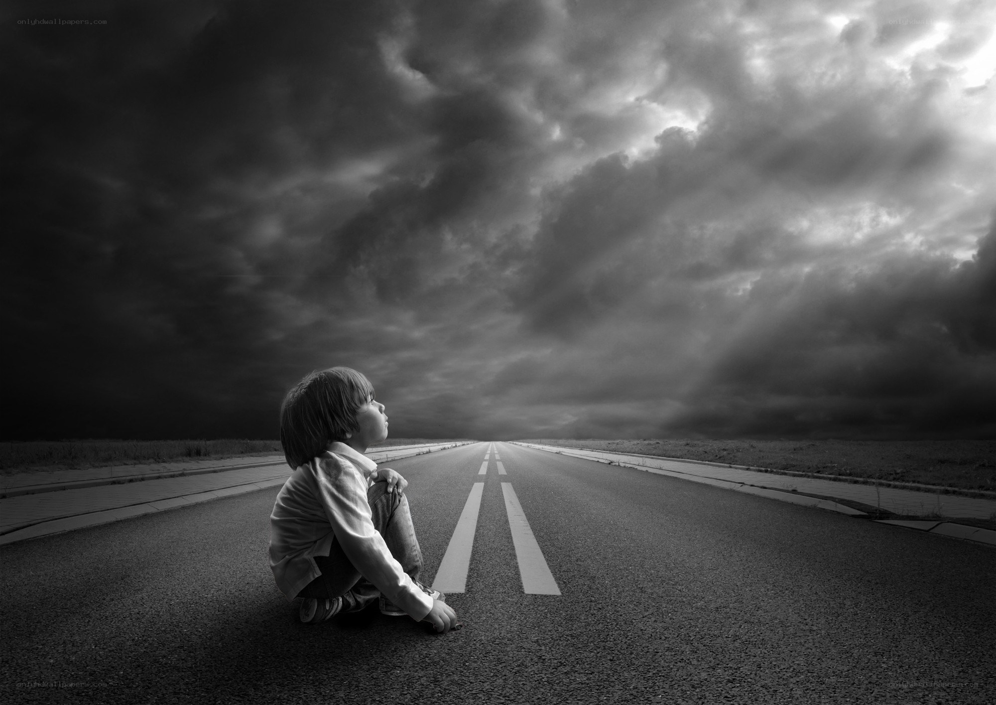 Child on a stormy road