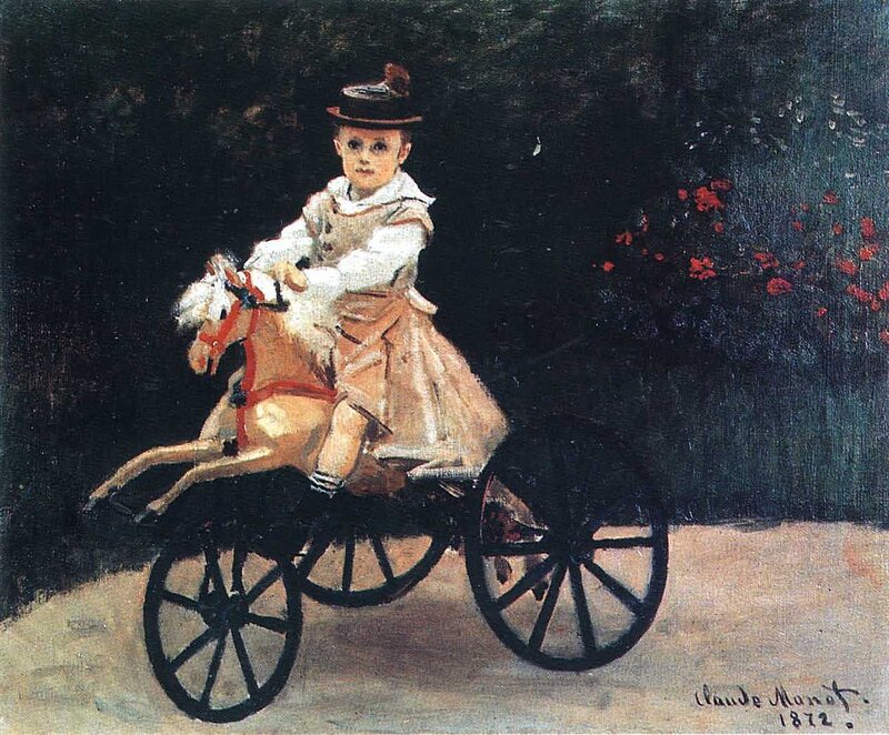 Child on a toy horse
