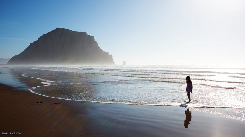 Child on Beach at Sunrise