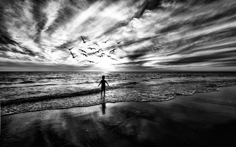 Child on Beach at Sunset — Black
