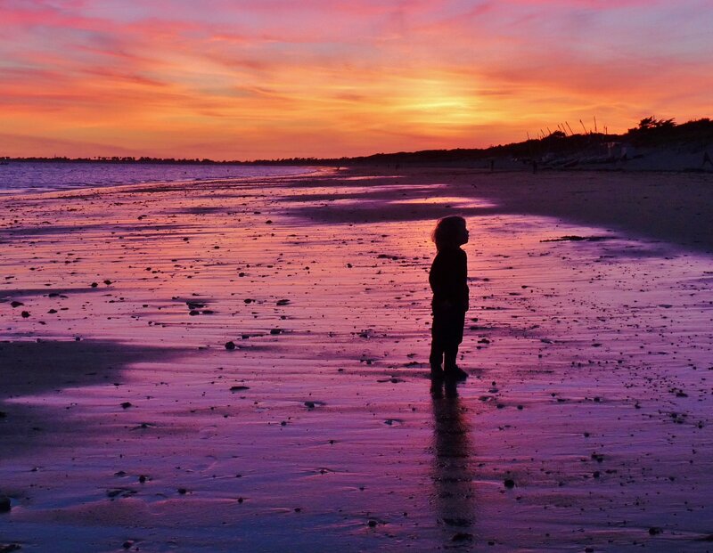 Child on Beach at Sunset — Purple