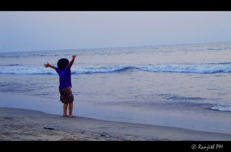 Child on Beach — Blue