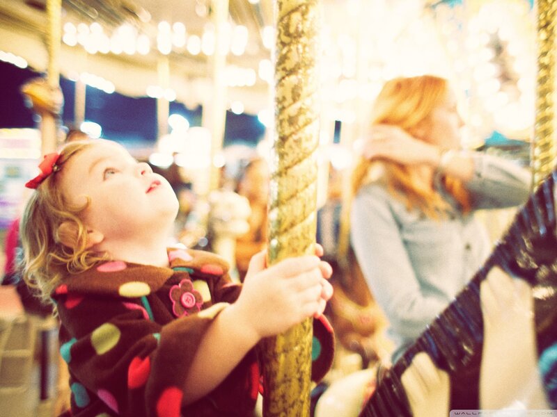 Child on Carousel — Brown