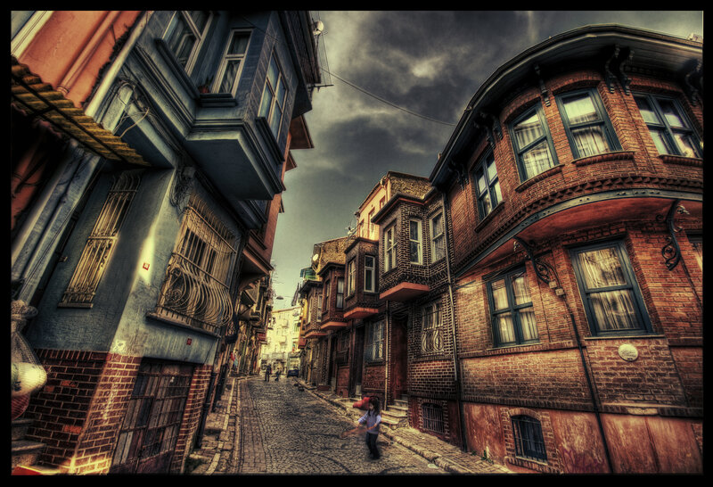 Child on Cobblestone Street