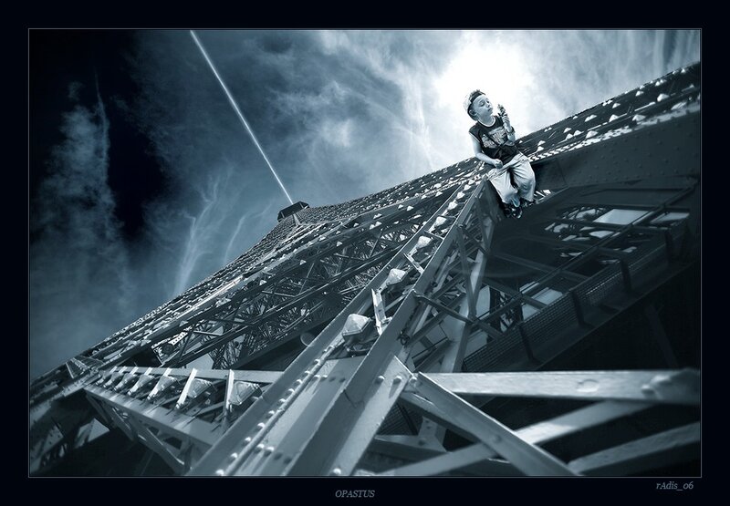 Child on Eiffel Tower structure