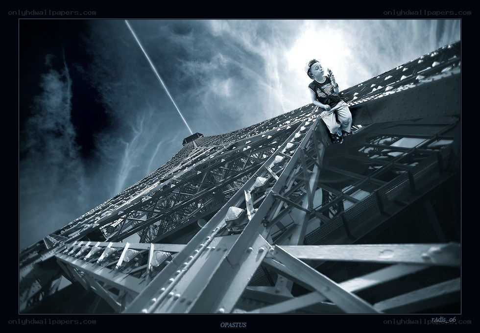 Child on Eiffel Tower structure