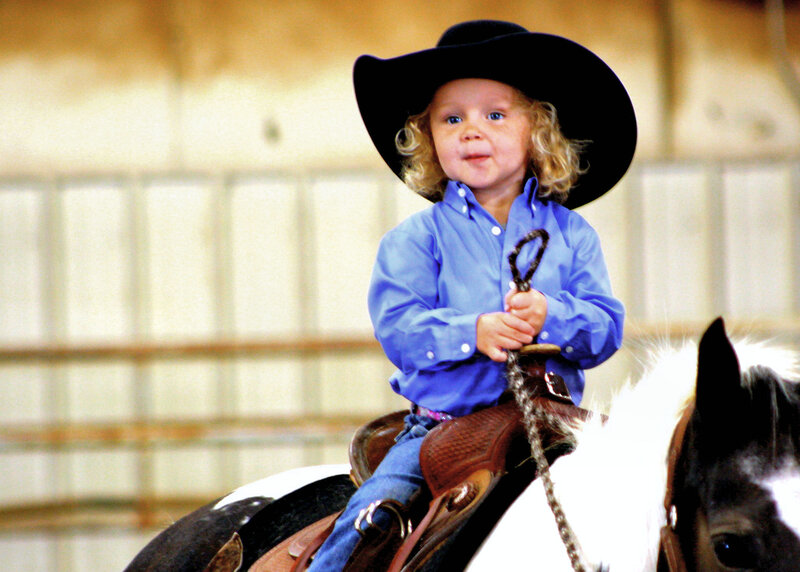 Child on Horseback — Blue