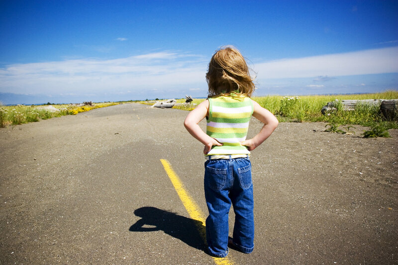 Child on Paved Road