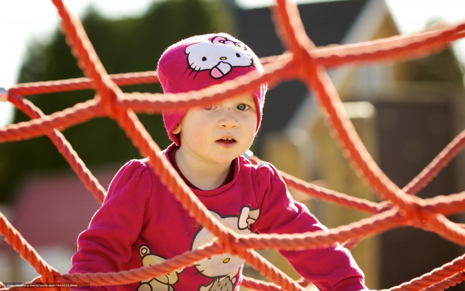 child on rope climber