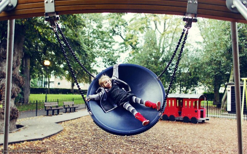 Child on Swing — Blue, Playful