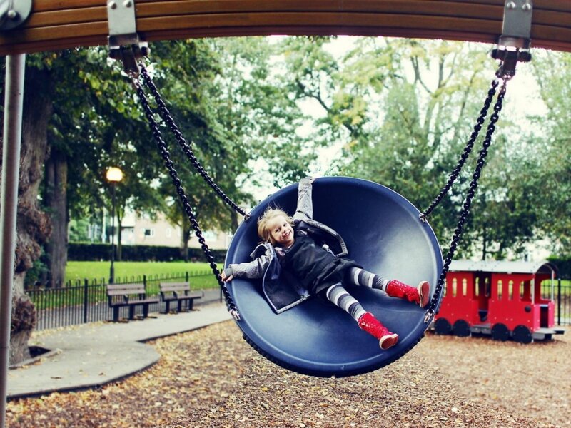 Child on Swing — Blue