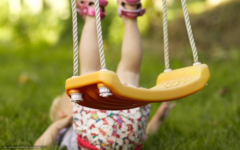 Child on Swing — Green, Playful, Afternoon