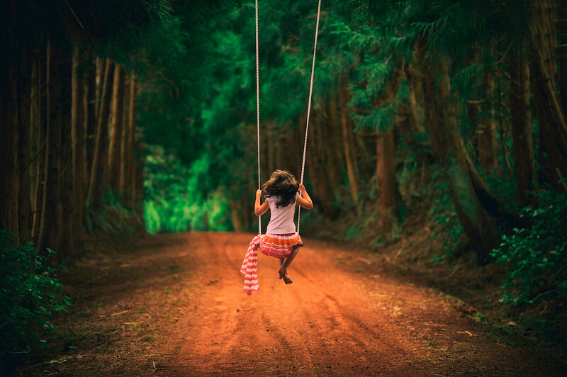 Child on Swing — Green