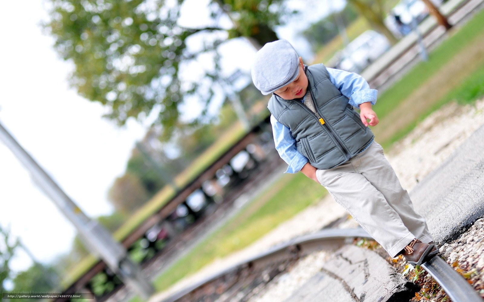 child on train tracks