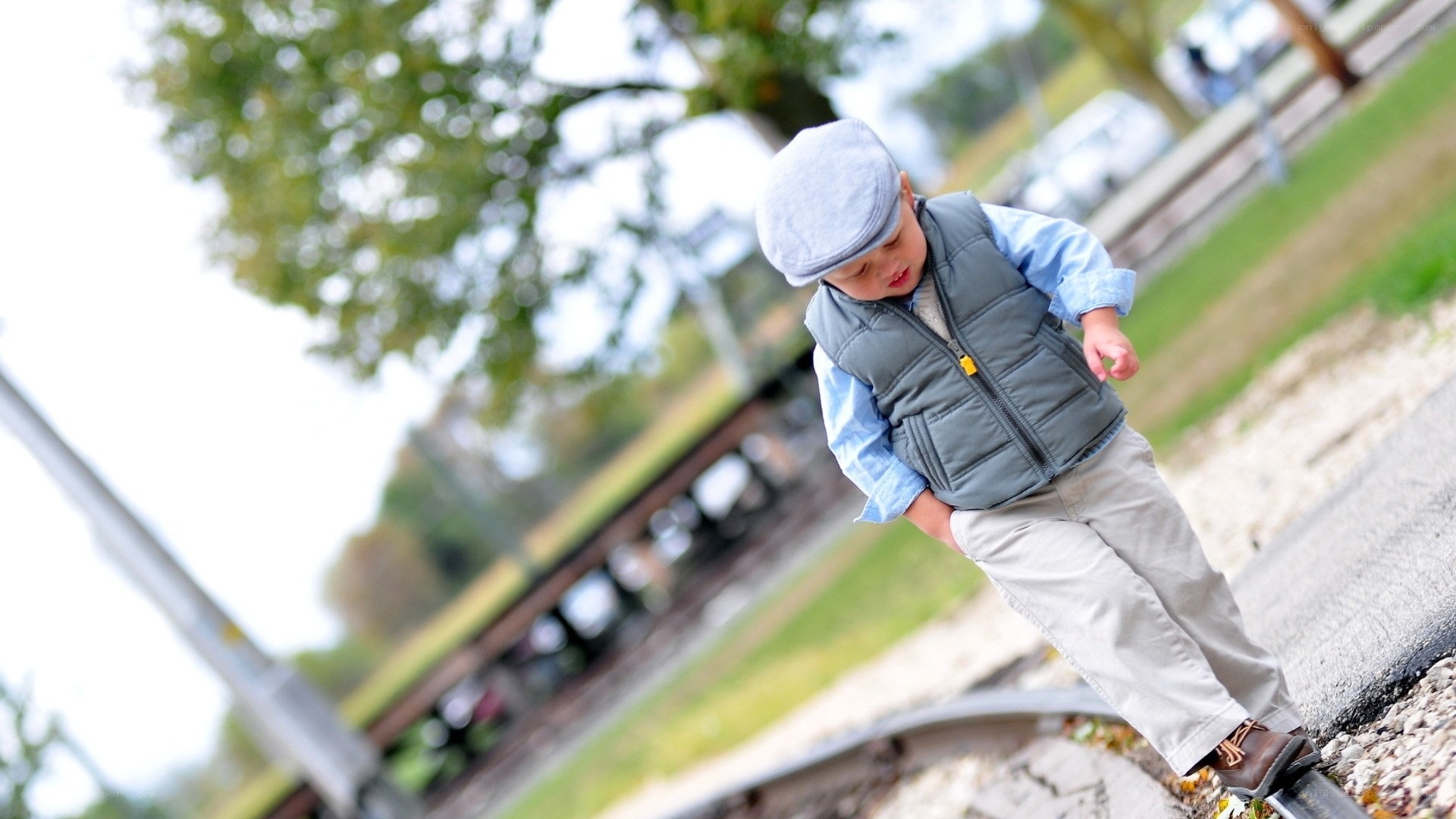 child on train tracks