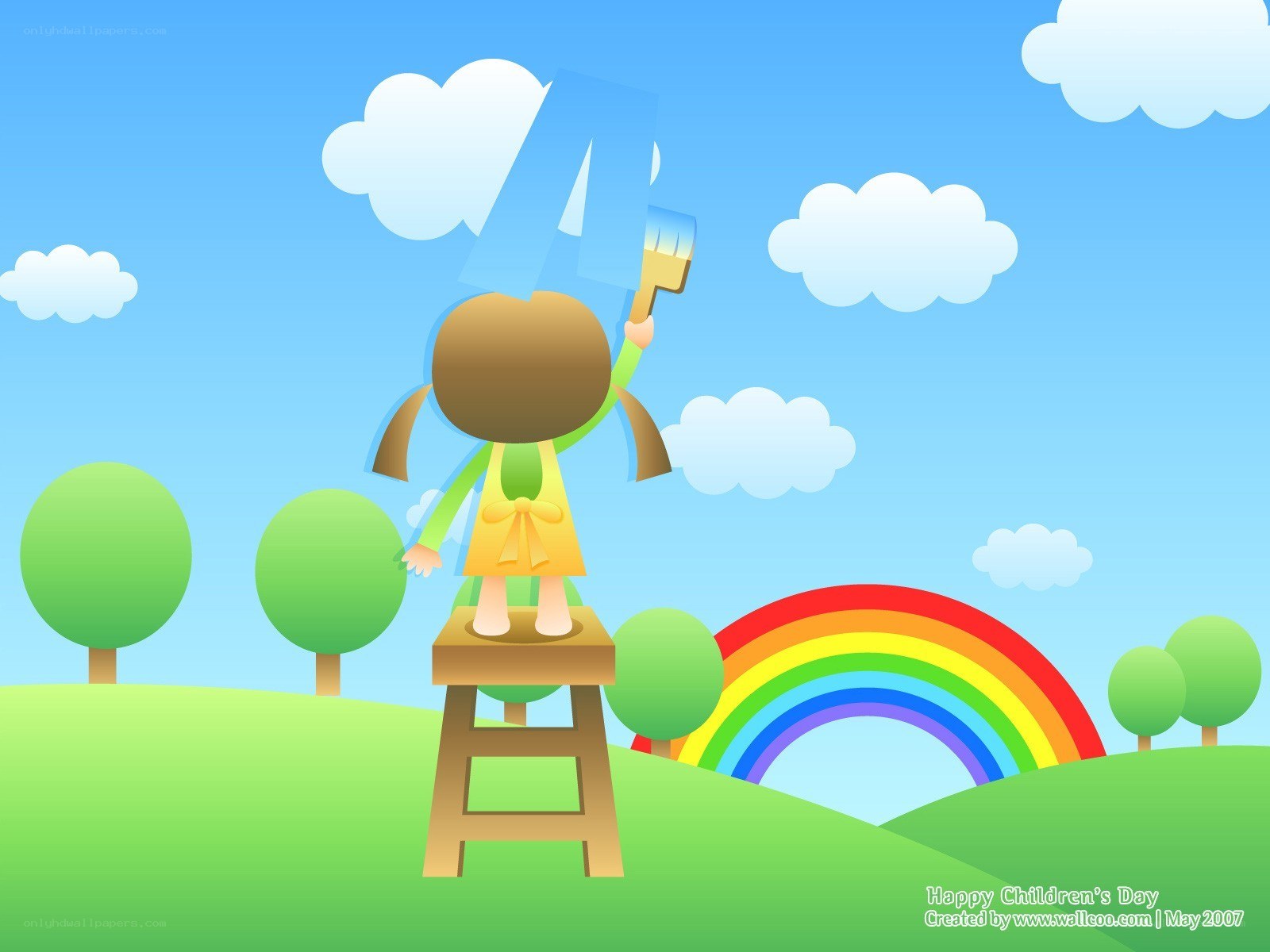 Child painting a rainbow