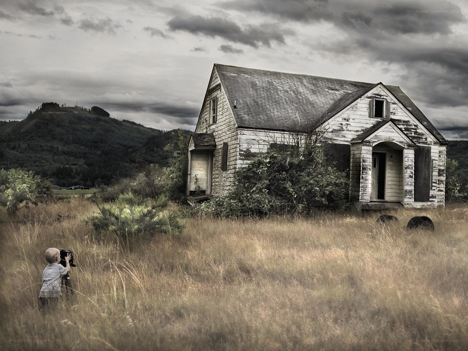 Child Photographing Abandoned House